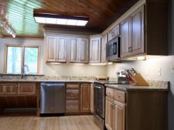 Click to enlarge image  - A custom kitchen with wood accents - New construction